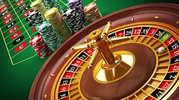 Fair play concept with dice and casino chips on a green table